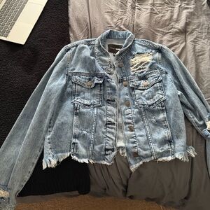 Distressed denim jacket